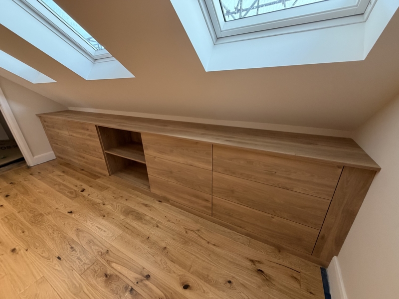 Bespoke hand-made wooden furniture for loft conversion in Beckenham